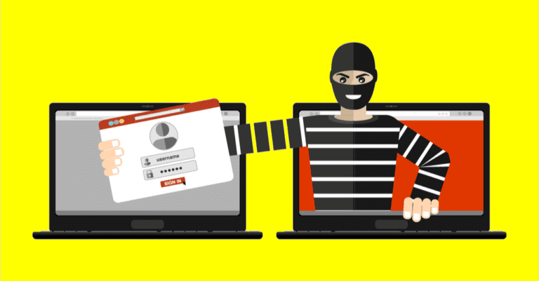 A hacker in a balaclava and striped shirt reaches out of a laptop screen to steal login credentials from another laptop.