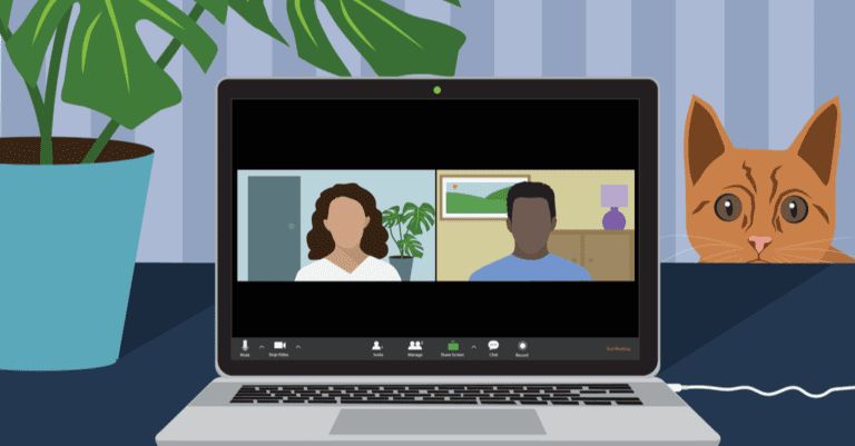 A laptop computer screen showing a brown-haired caucasian woman and an african american man on a desk with a monstera plant and an orange striped cat