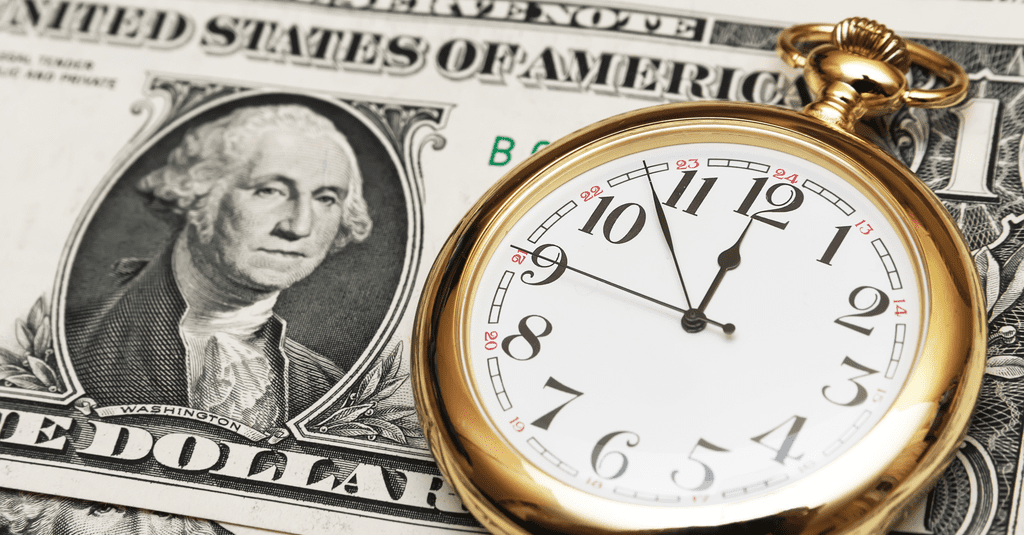 a gold pocket watch is depicted on a one dollar bill
